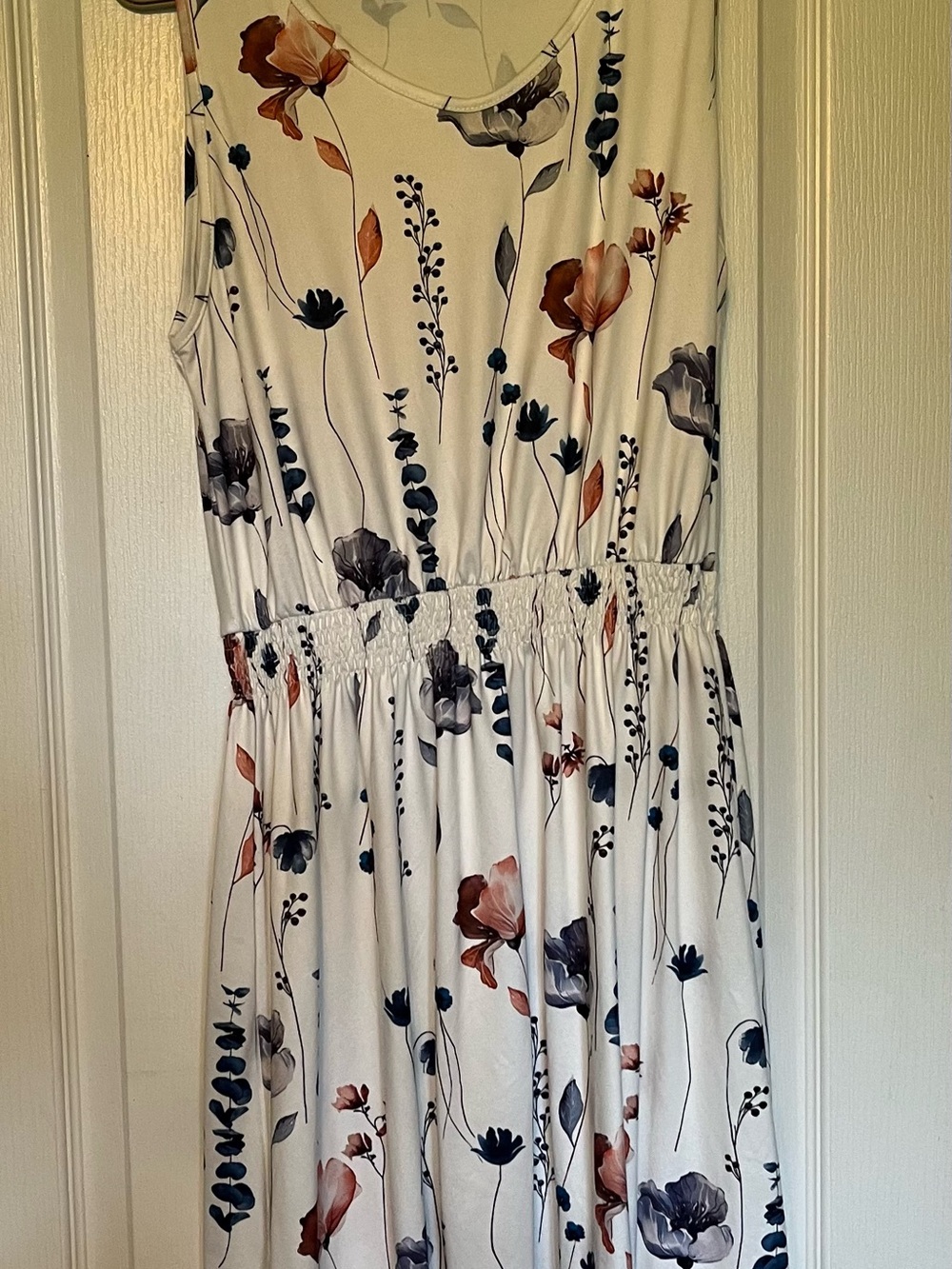 Sleeveless White Floral Midi Dress with Smocked Waist